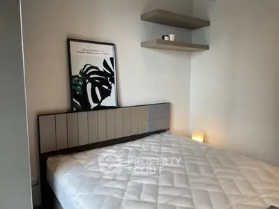 Modern bedroom with stylish decor and cozy lighting, perfect for relaxation.