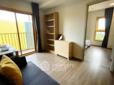 Modern apartment interior with cozy living room and bedroom view
