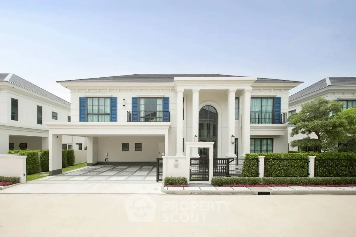 Luxurious modern villa with grand entrance and spacious driveway