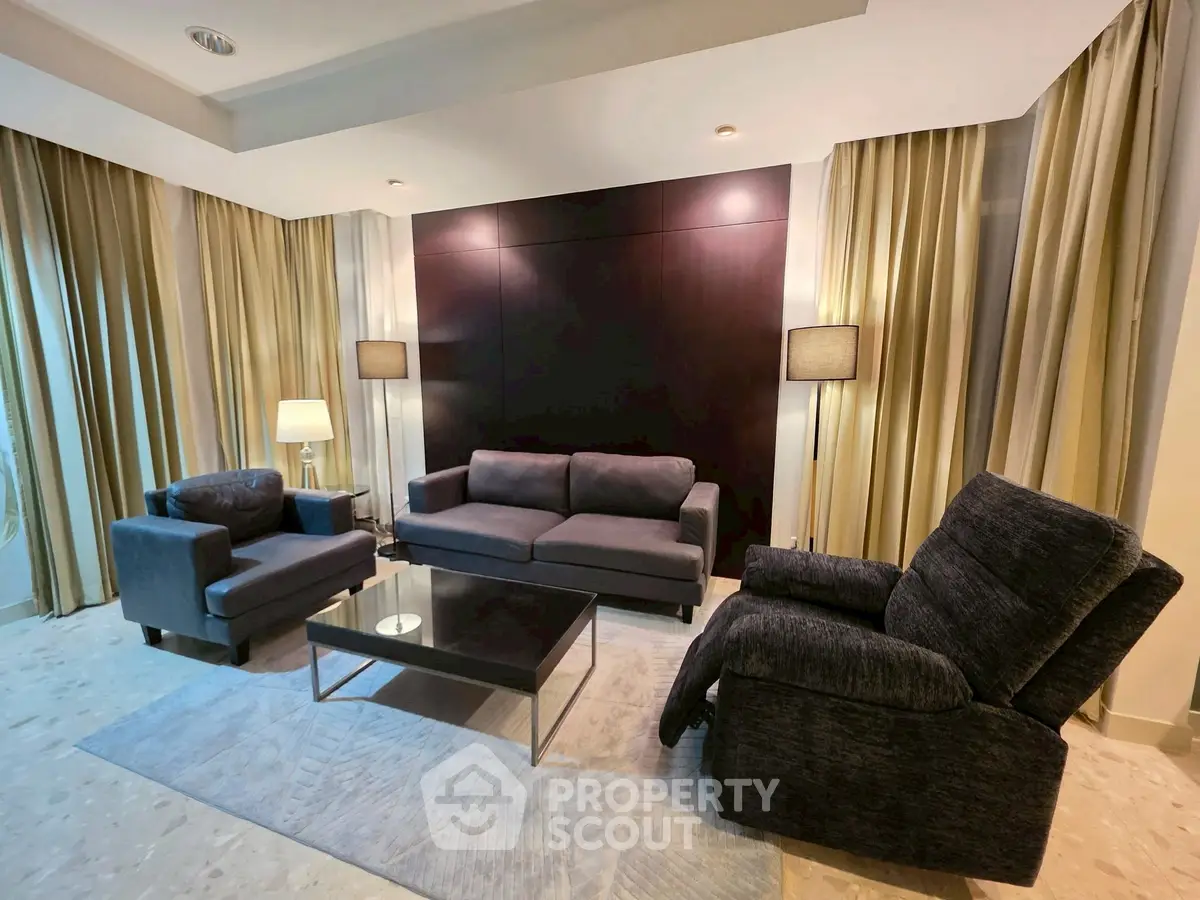 Luxurious living room with modern furniture and elegant lighting