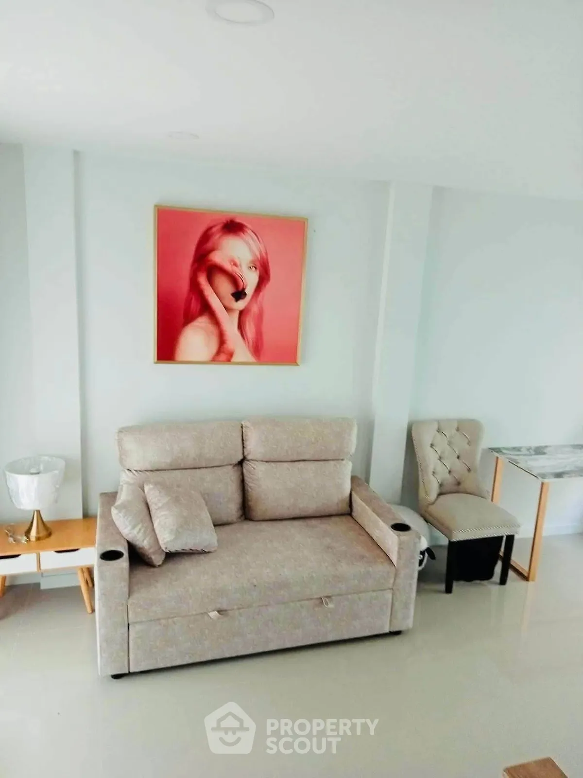 Chic living room with modern sofa and stylish decor, perfect for cozy relaxation.