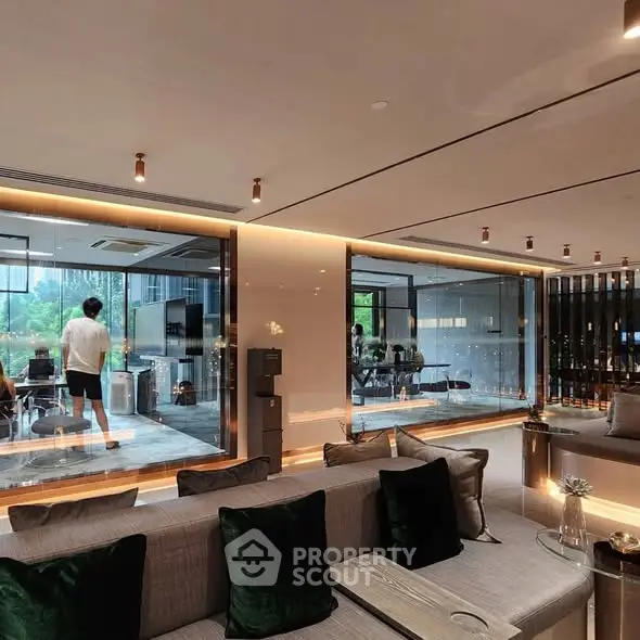 Luxurious modern living room with floor-to-ceiling windows and elegant decor