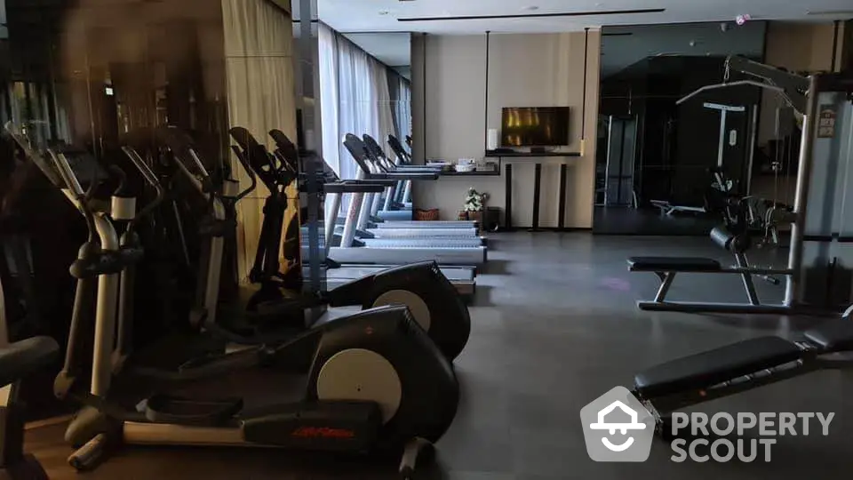 Modern gym with state-of-the-art fitness equipment and sleek design