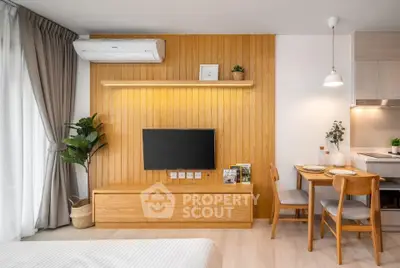 Modern living room with wooden accents, wall-mounted TV, and cozy dining area.
