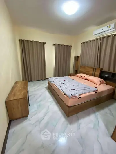 Cozy bedroom with modern wooden furniture and soft lighting