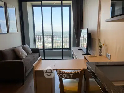 Modern living room with stunning city view and cozy furnishings