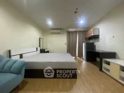 Spacious modern bedroom with minimalist furniture and natural light