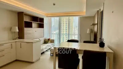 Modern living room with city view, featuring sleek furniture and ambient lighting.