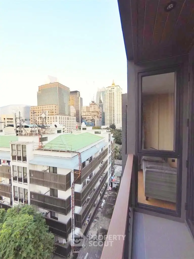 Stunning city view from a high-rise balcony, perfect for urban living enthusiasts.