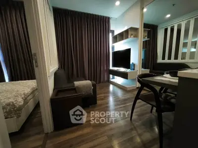 Modern studio apartment with cozy living area and stylish decor