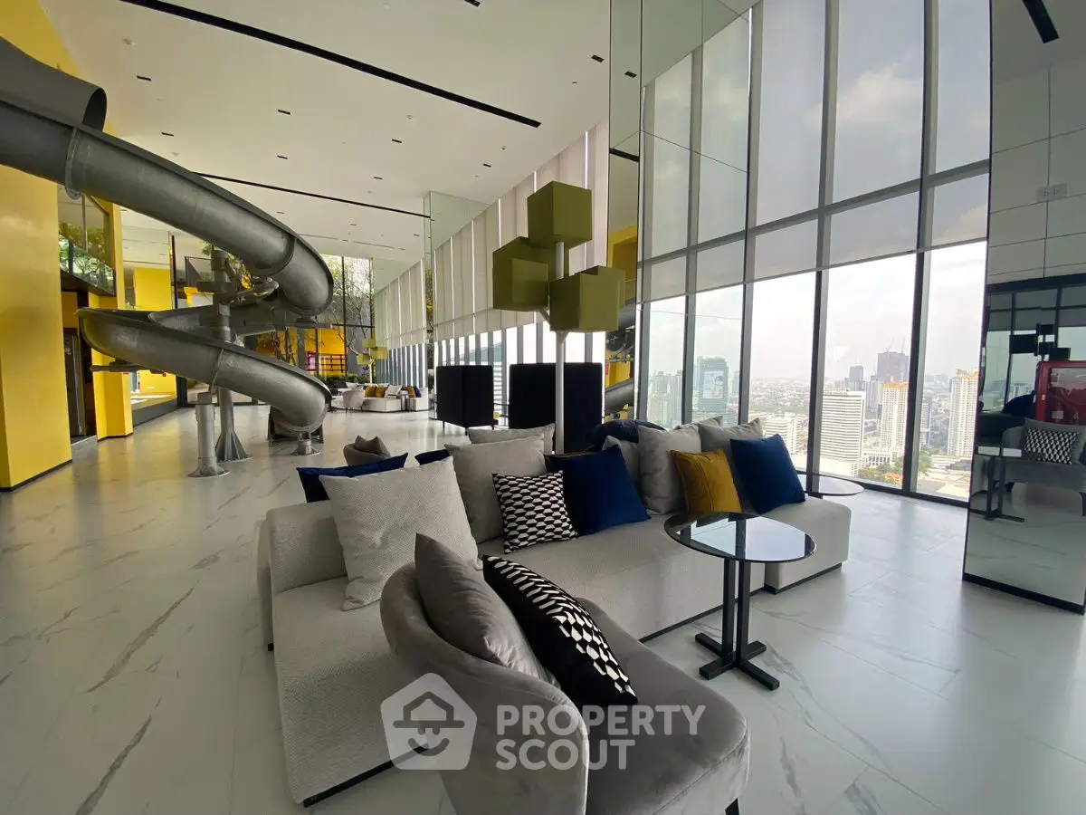 Luxurious modern living room with panoramic city view and unique slide feature