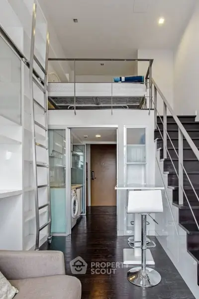 Modern loft apartment with mezzanine and sleek interior design