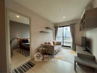 Modern living room with city view and cozy bedroom in stylish apartment