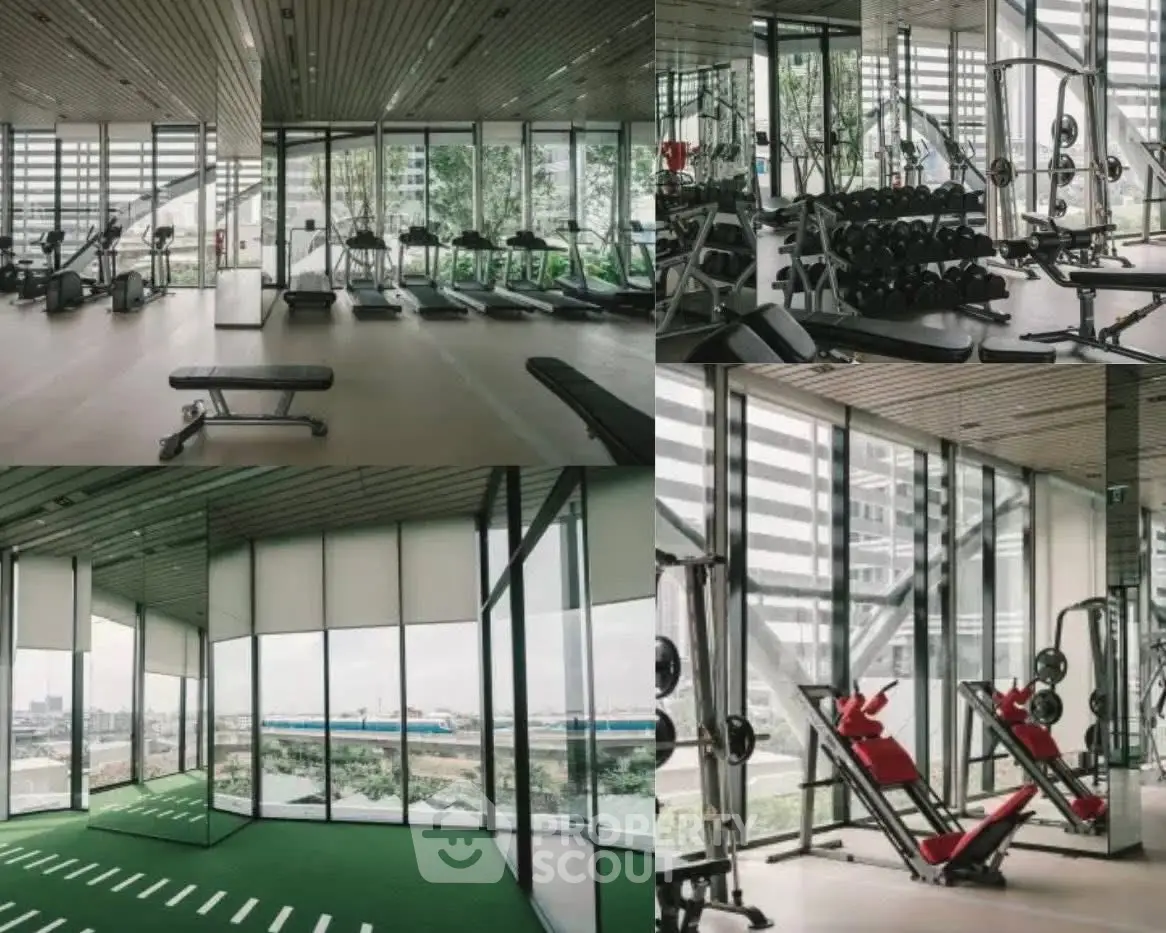 Modern gym with panoramic windows and state-of-the-art equipment in a luxury building.