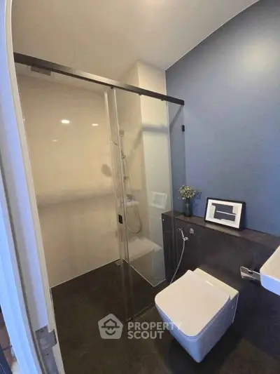 Modern bathroom with sleek shower and minimalist design