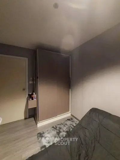 Cozy bedroom with modern wardrobe and stylish decor