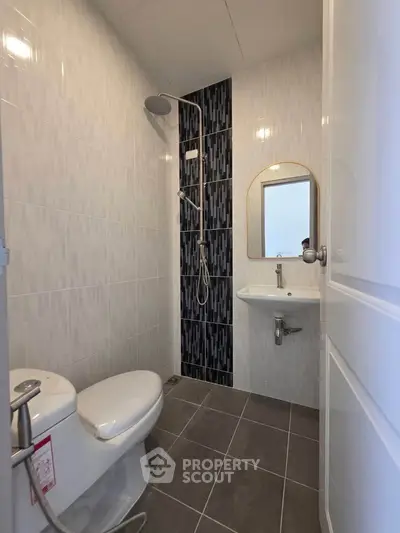 Modern bathroom with sleek shower and stylish tile design