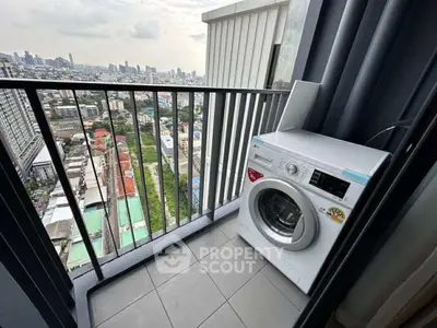 High-rise balcony with washing machine and stunning city view