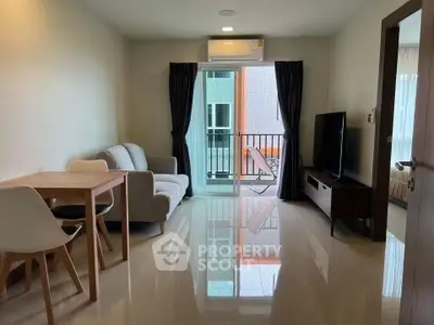 Modern living room with balcony access in a stylish apartment