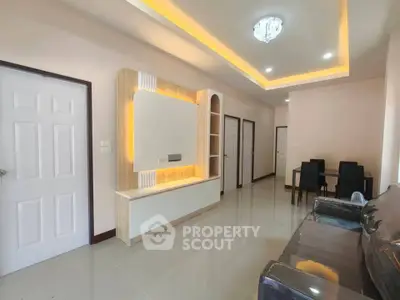 Modern living room with sleek furniture and ambient lighting