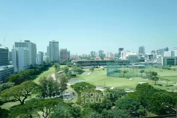 Stunning cityscape view with lush green park and skyline