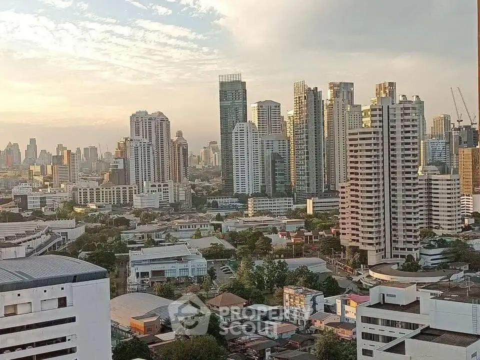 Stunning cityscape view showcasing modern high-rise buildings at sunset, perfect for urban living enthusiasts.