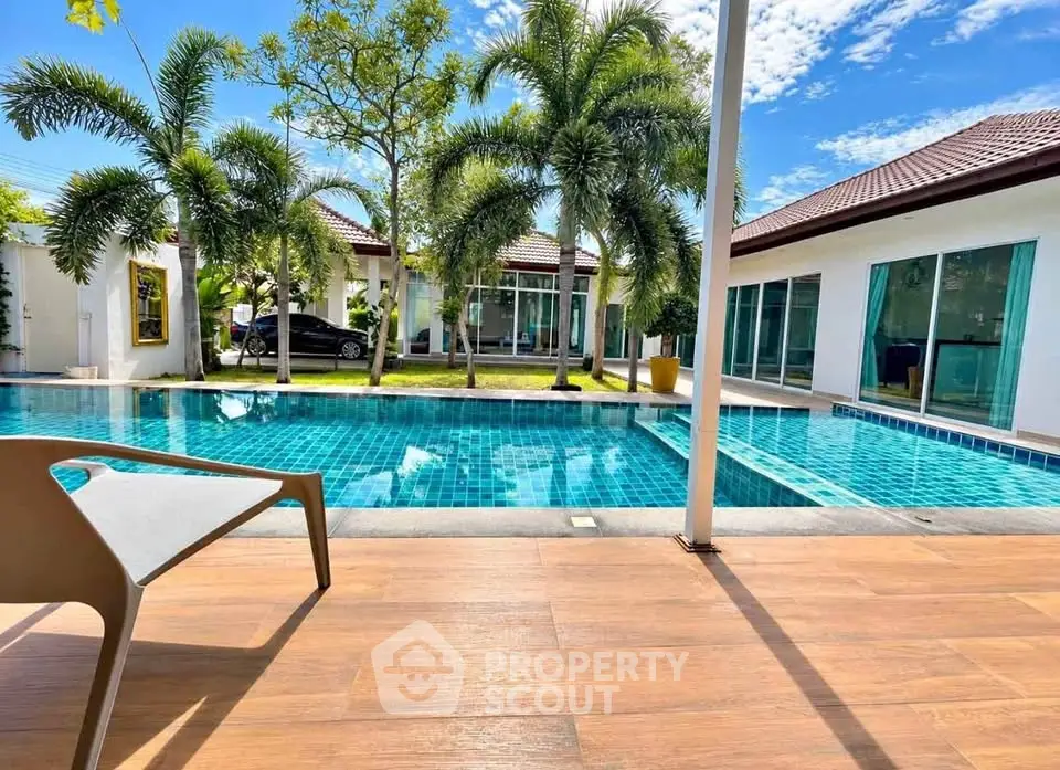 Luxurious villa with private pool and lush garden, perfect for relaxation and entertaining.
