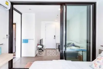 Modern apartment interior with sliding glass doors and stylish decor