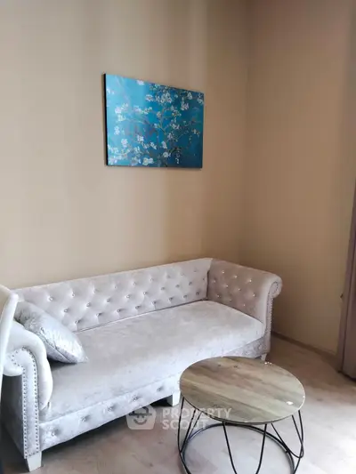 Elegant living room with plush sofa and stylish coffee table