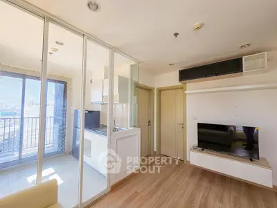 Modern apartment interior with open layout and balcony view