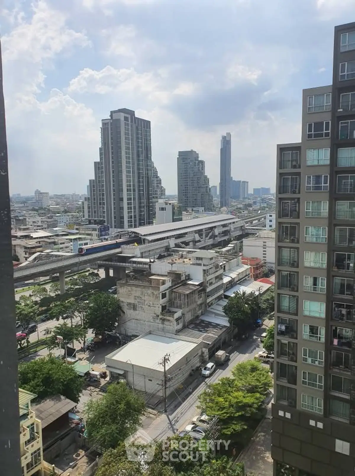 Stunning urban cityscape view from high-rise apartment balcony