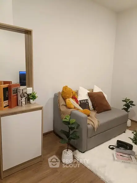 Cozy living room with plush sofa and stylish decor