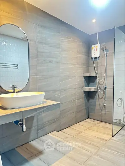 Modern bathroom with sleek design and glass shower enclosure