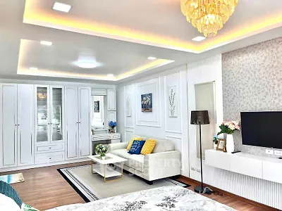 Luxurious living room with elegant decor and modern lighting