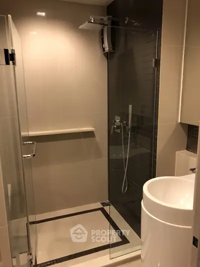 Modern bathroom with sleek shower design and elegant fixtures