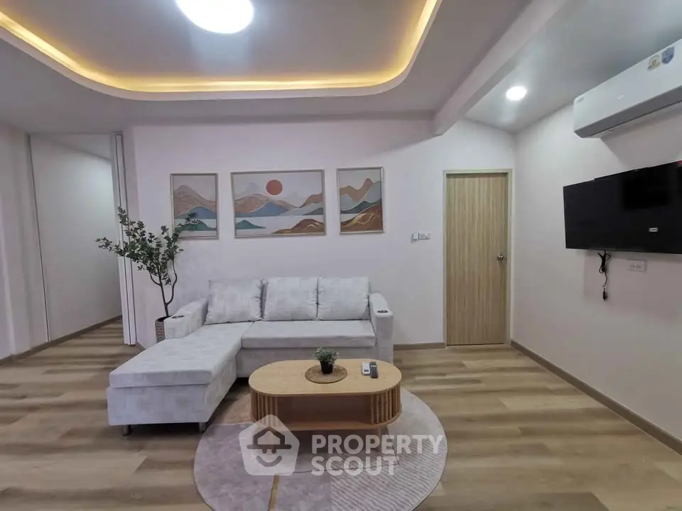 Modern living room with stylish decor and cozy seating area