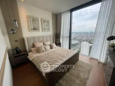 Luxurious bedroom with stunning city view in high-rise apartment
