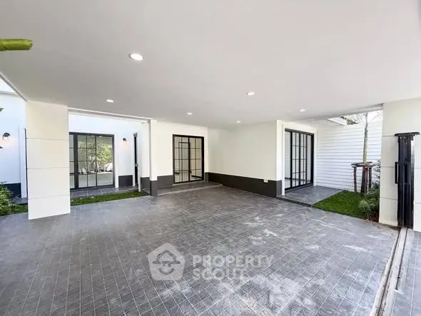 Spacious modern parking area with sleek design and ample lighting