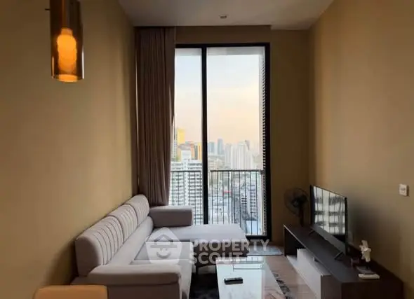 Modern living room with city view, featuring sleek furniture and large windows.