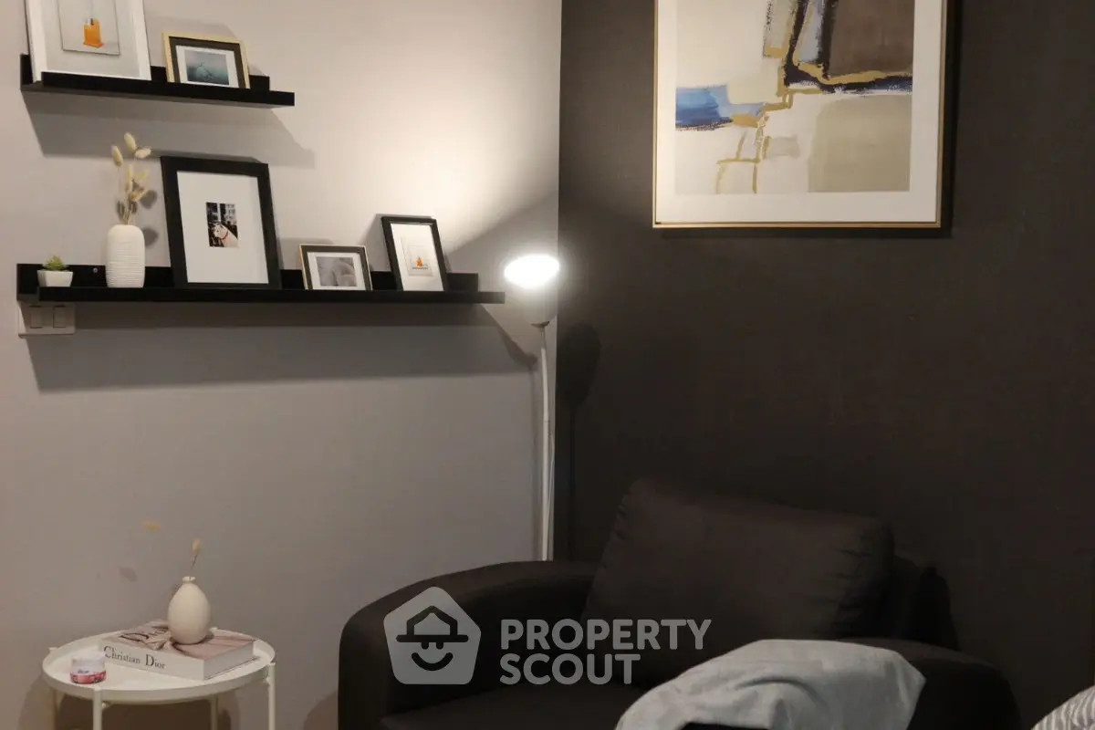 Cozy living room corner with modern decor and stylish armchair