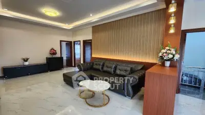 Luxurious living room with modern decor and elegant lighting