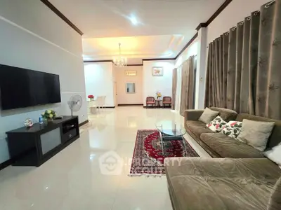 Spacious living room with elegant decor and modern furnishings