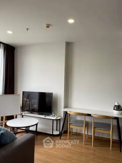 Modern living room with sleek furniture and natural light