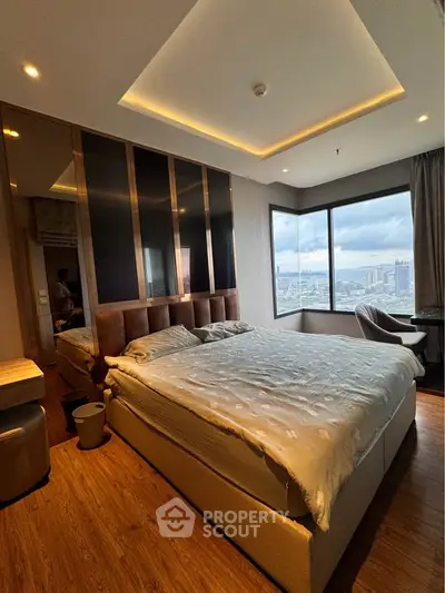 Luxurious bedroom with stunning city view and modern decor