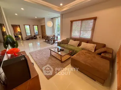 Spacious living room with cozy sectional sofa and modern decor