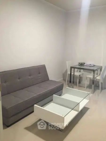 Modern living room with sleek furniture and minimalist design