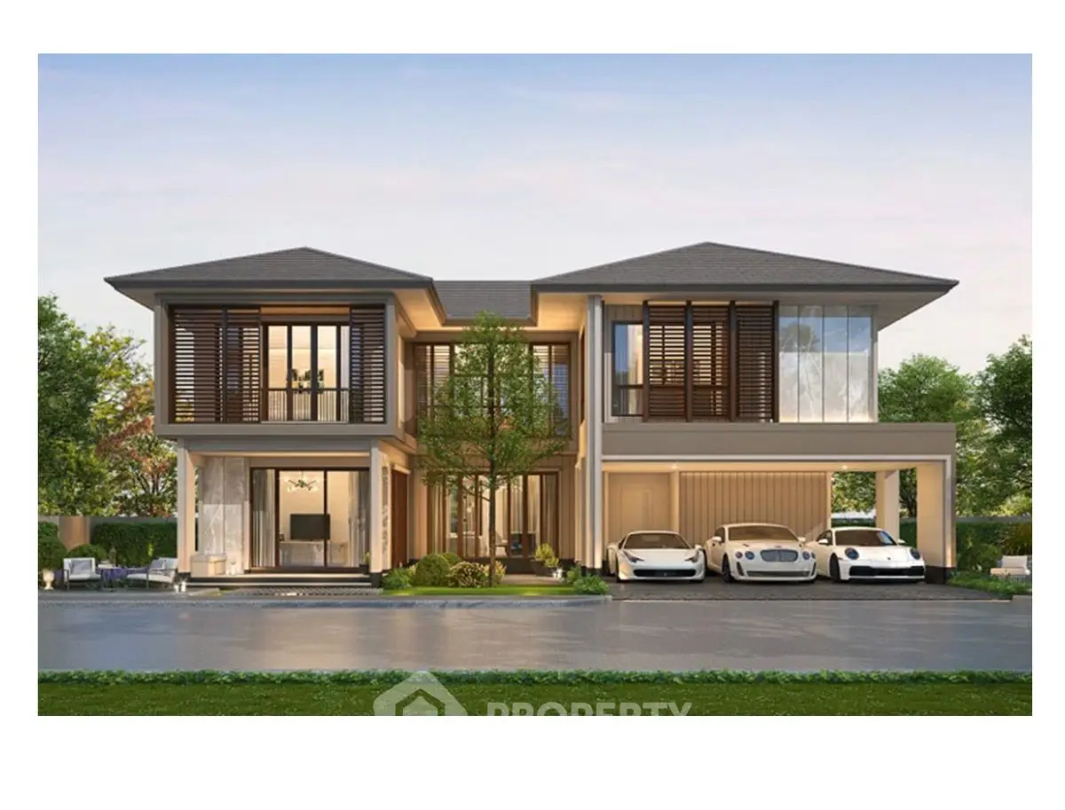 Luxurious modern two-story house with sleek design and spacious driveway.