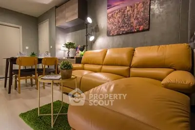 Luxurious living room with modern leather sofa and stylish decor
