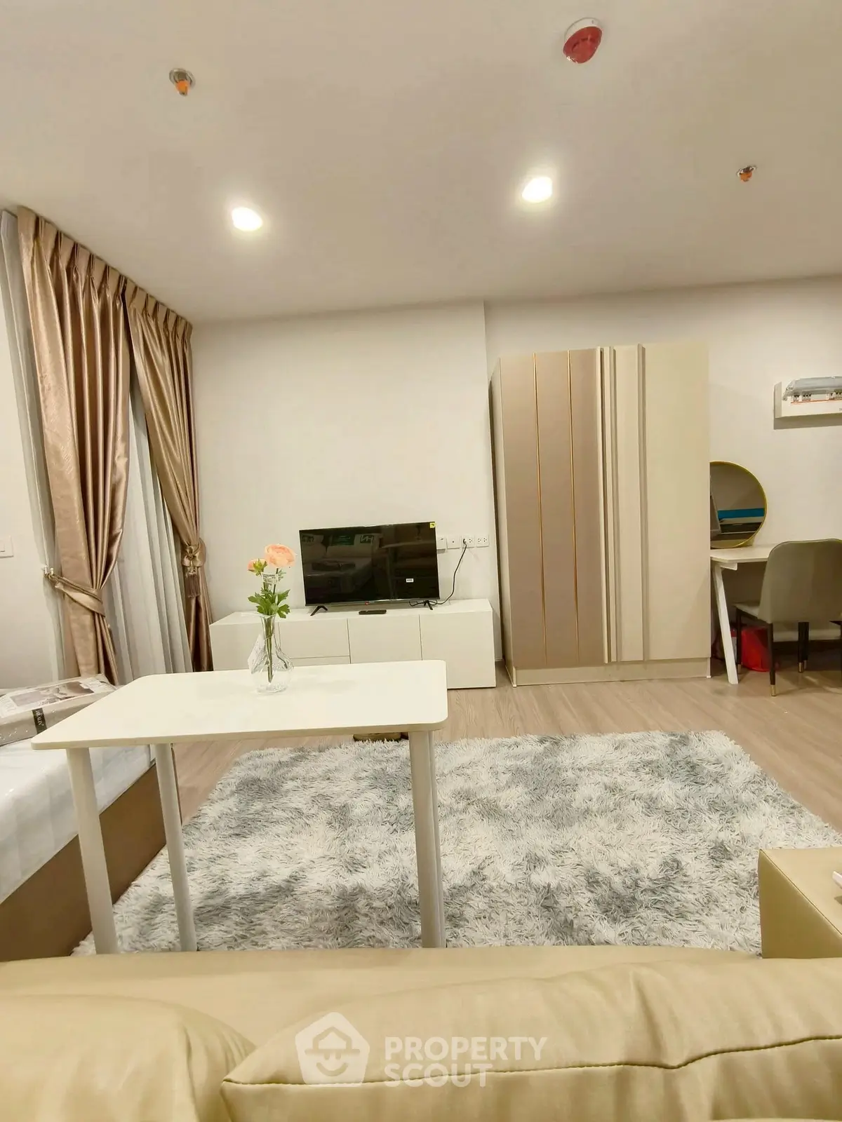 Modern living room with cozy decor and stylish furniture