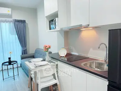 Modern kitchen and dining area with sleek design and cozy ambiance